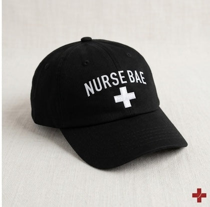 “Black Nurse Bae embroidered dad hat worn by woman, minimalist nurse hat with white stitching and adjustable fit”